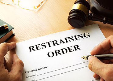 Filing a restraining order in Broward County: legal document preparation.